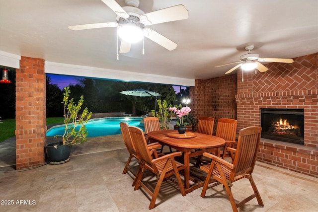 interior space with an outdoor brick fireplace