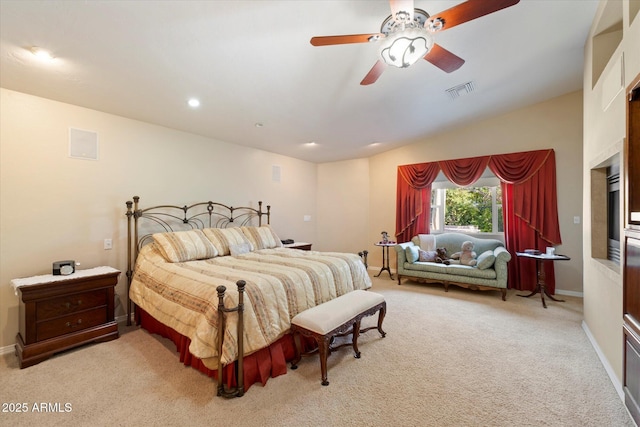 bedroom featuring ceiling fan, lofted ceiling, and light carpet