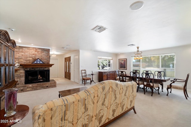 carpeted living room featuring crown molding and a fireplace