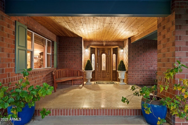 property entrance with covered porch