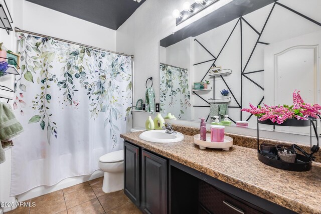 6328 W Fawn Dr, Laveen, AZ 85339 - bathroom featuring vanity, tile patterned floors, toilet, and shower / bath combo with shower curtain