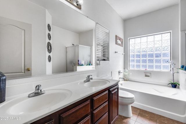 6328 W Fawn Dr, Laveen, AZ 85339 - bathroom featuring double vanity, a sink, a garden tub, and tile patterned floors