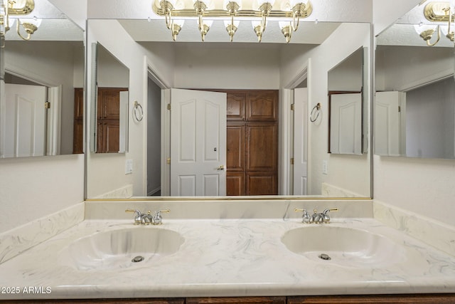 full bath with double vanity and a sink