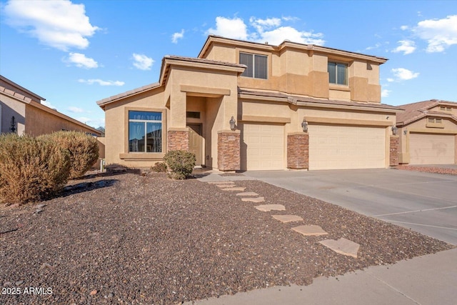 view of front of property with a garage