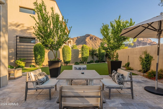 view of patio / terrace featuring a mountain view