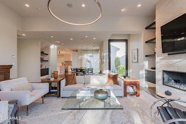 living room featuring a fireplace