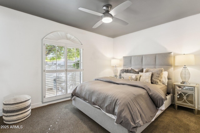 carpeted bedroom featuring ceiling fan