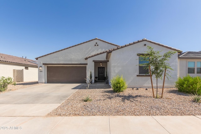 47469 W Cansados Rd, Maricopa, AZ 85139 - mediterranean / spanish-style house with an attached garage, stucco siding, driveway, and a tiled roof