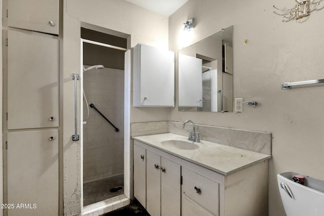 full bath featuring a shower stall and vanity