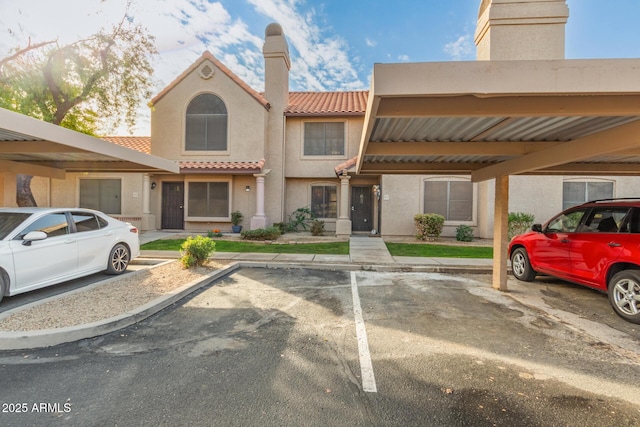 view of front facade with a carport