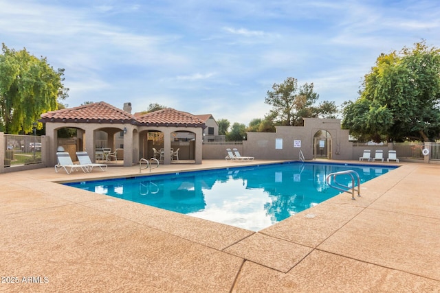 view of pool featuring a gazebo and a patio