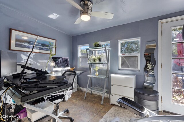 miscellaneous room featuring ceiling fan and light tile patterned flooring