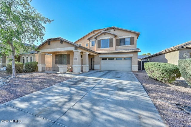 16112 W Durango St, Goodyear, AZ 85338 - craftsman-style home with an attached garage, stucco siding, and driveway