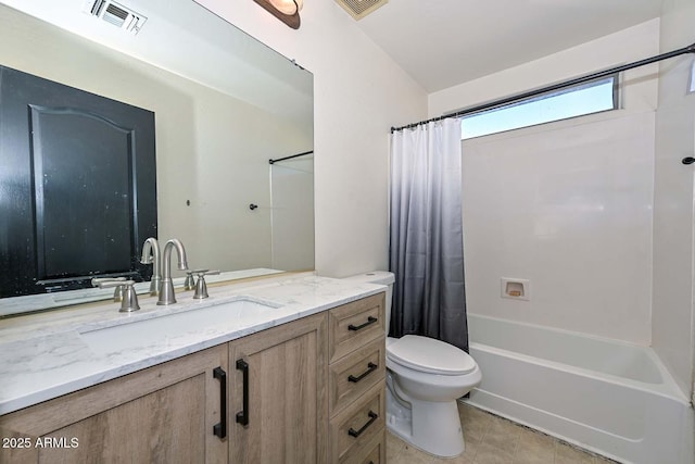 16112 W Durango St, Goodyear, AZ 85338 - bathroom with visible vents, shower / bath combo with shower curtain, tile patterned flooring, vanity, and toilet