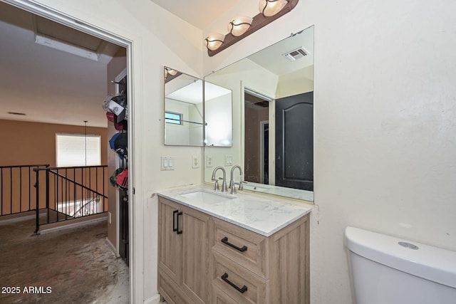 16112 W Durango St, Goodyear, AZ 85338 - bathroom featuring vanity, toilet, and visible vents