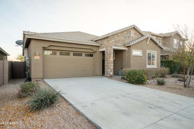 view of front of property with a garage