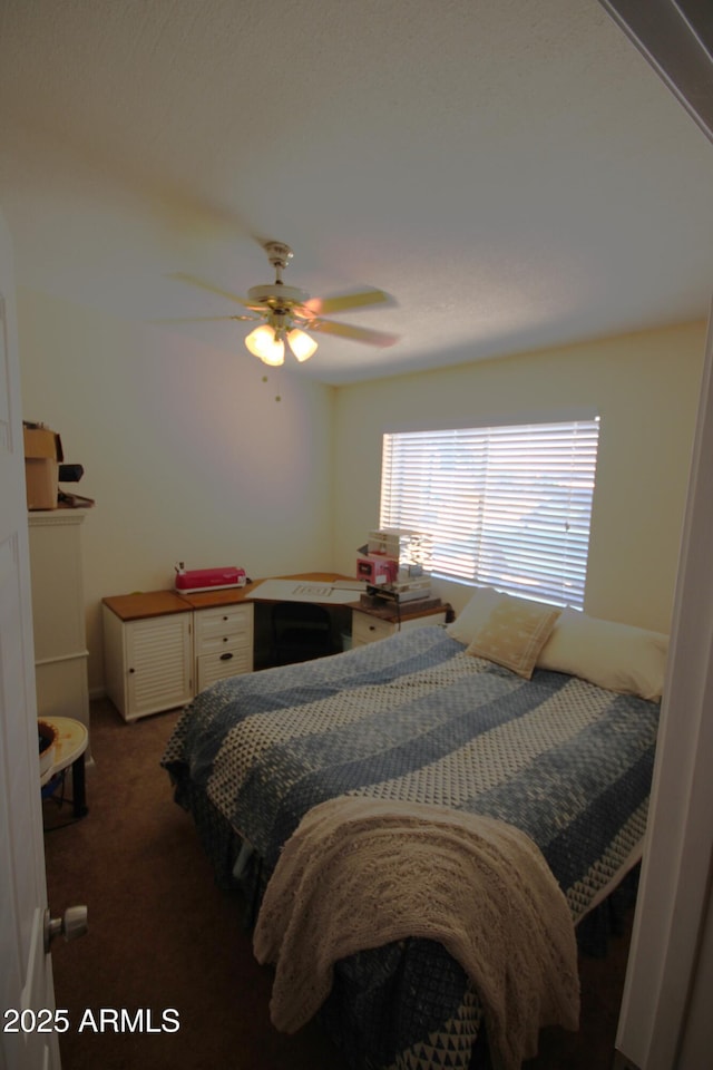 bedroom featuring carpet floors and a ceiling fan