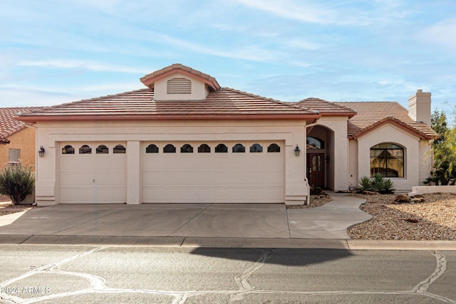 view of front of property featuring a garage