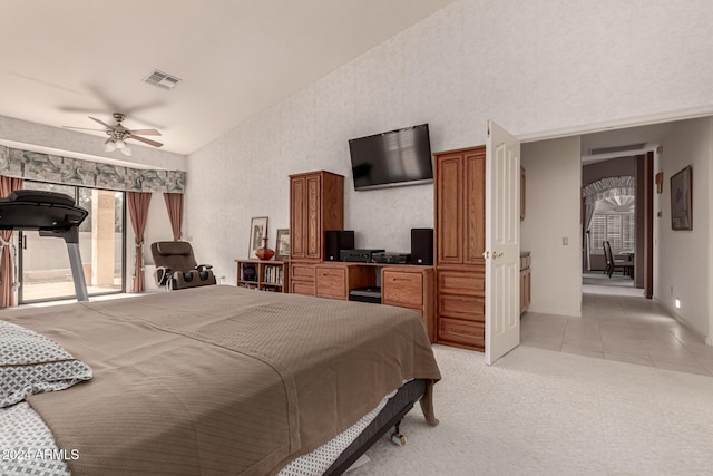 bedroom with light carpet, ceiling fan, and lofted ceiling