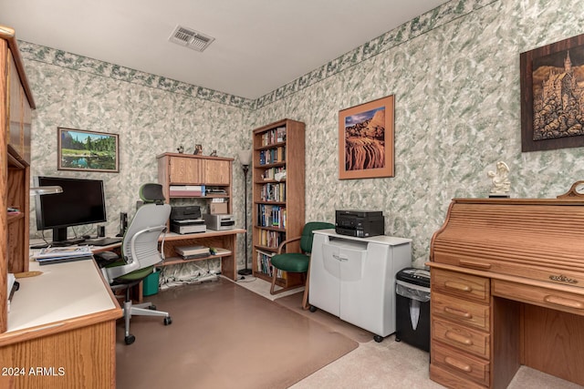 office area featuring light colored carpet