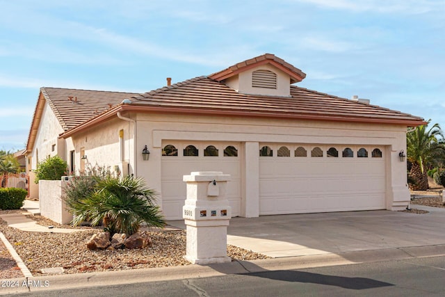 view of front of house with a garage