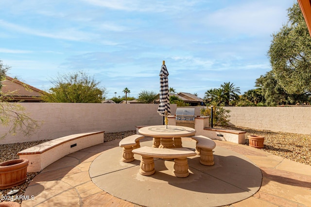 view of patio featuring area for grilling and grilling area