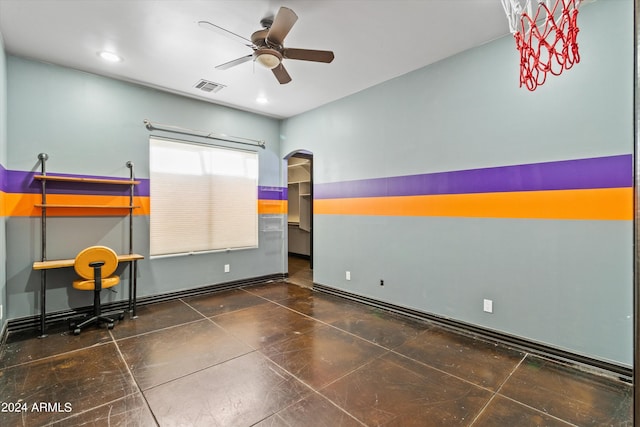 spare room featuring visible vents, arched walkways, a ceiling fan, and recessed lighting