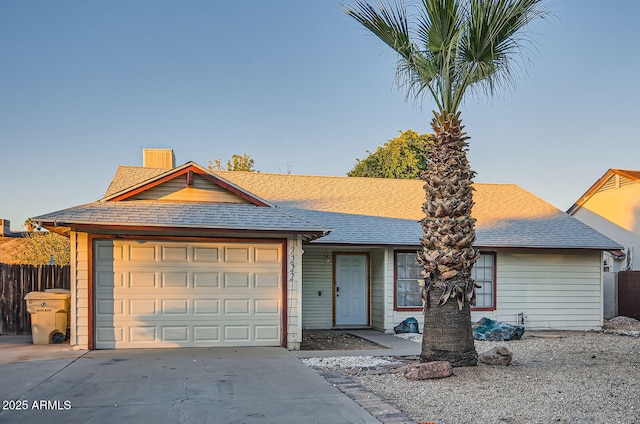 7222 W Maryland Ave, Glendale, AZ 85303 - ranch-style house featuring concrete driveway, a garage, roof with shingles, and a chimney