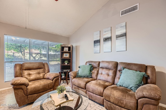 7222 W Maryland Ave, Glendale, AZ 85303 - living area featuring lofted ceiling and baseboards