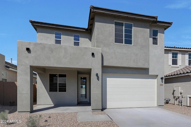 view of front of property with a garage