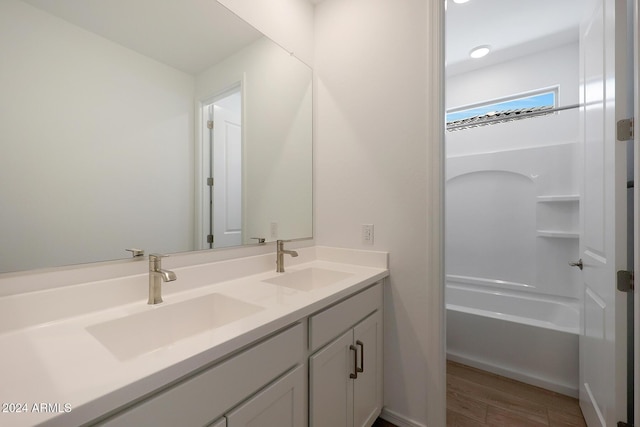 bathroom featuring vanity and hardwood / wood-style floors