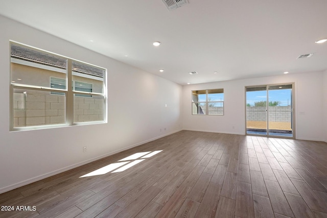 spare room featuring hardwood / wood-style floors