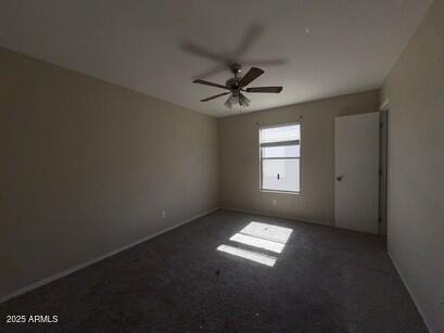 990 E Desert Rose Trl, San Tan Valley, AZ 85143 - unfurnished room featuring carpet floors and a ceiling fan