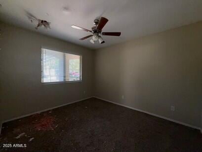 990 E Desert Rose Trl, San Tan Valley, AZ 85143 - unfurnished room with baseboards and ceiling fan