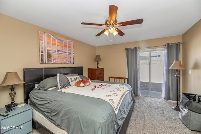 carpeted bedroom with access to exterior and ceiling fan