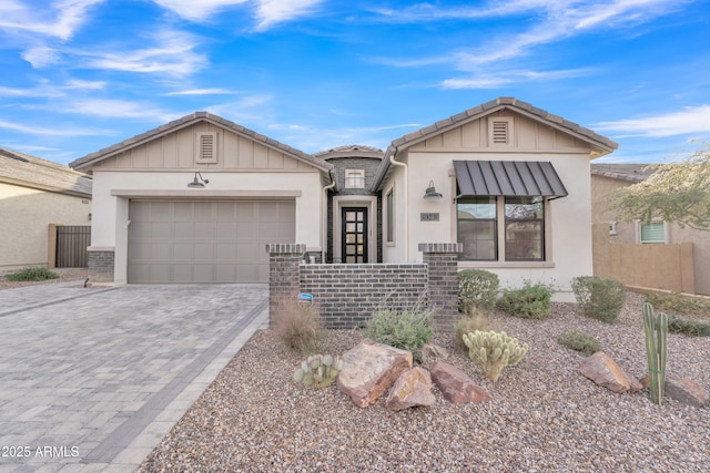 view of front of home with a garage