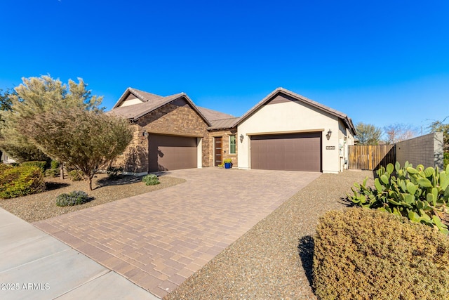 ranch-style home with a garage