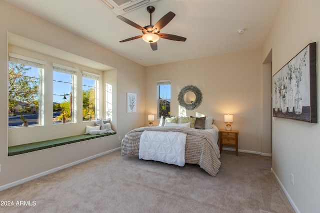 carpeted bedroom with ceiling fan