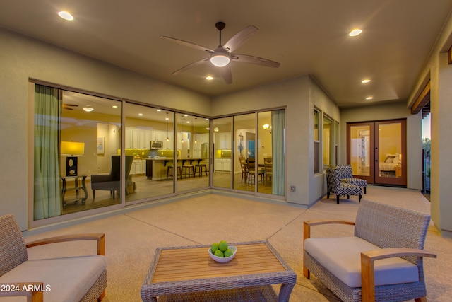 view of patio / terrace featuring french doors and ceiling fan