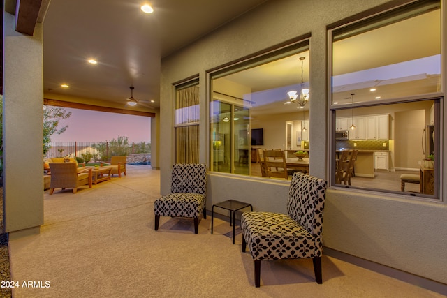 patio terrace at dusk with ceiling fan