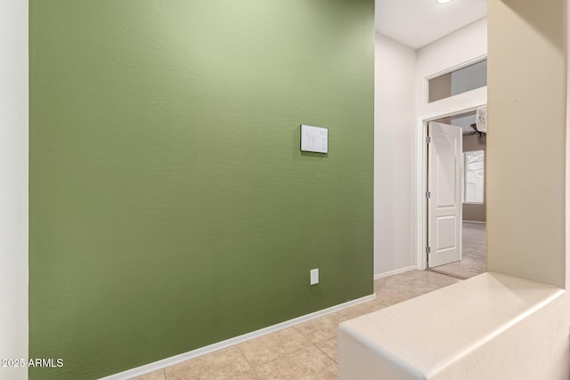 41804 W Carlisle Ln, Maricopa, AZ 85138 - hall featuring light tile patterned floors and baseboards