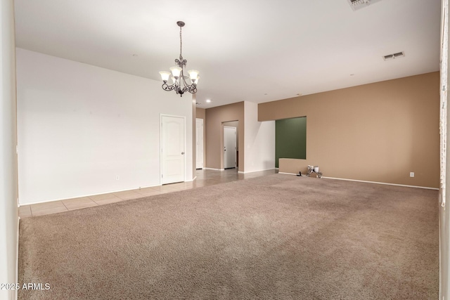 41804 W Carlisle Ln, Maricopa, AZ 85138 - carpeted empty room with a chandelier, tile patterned floors, baseboards, and recessed lighting