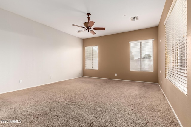 41804 W Carlisle Ln, Maricopa, AZ 85138 - carpeted spare room with ceiling fan and baseboards