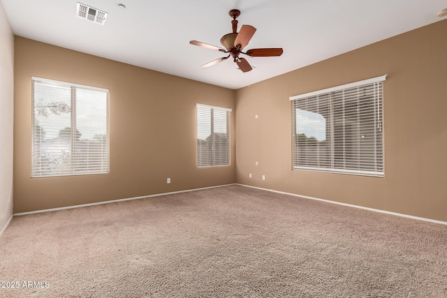 41804 W Carlisle Ln, Maricopa, AZ 85138 - carpeted empty room featuring baseboards, a ceiling fan, and a smoke detector