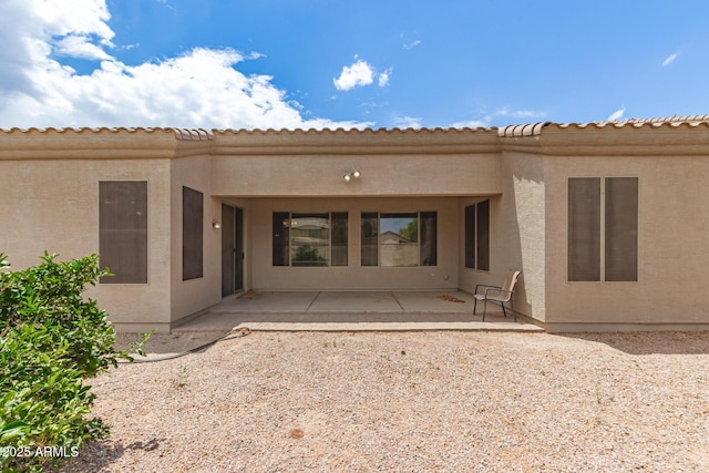 41804 W Carlisle Ln, Maricopa, AZ 85138 - back of house featuring a patio area and stucco siding
