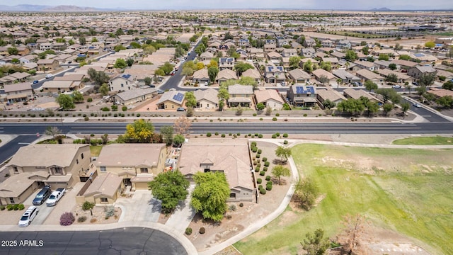 41804 W Carlisle Ln, Maricopa, AZ 85138 - aerial overview of property's location with nearby suburban area and a mountainous background