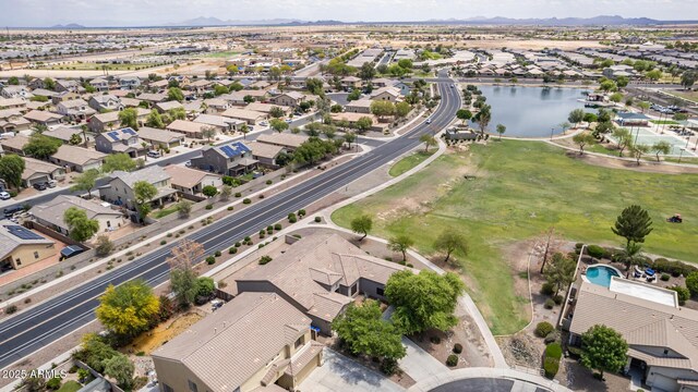 41804 W Carlisle Ln, Maricopa, AZ 85138 - aerial view of property's location with nearby suburban area and a water and mountain view