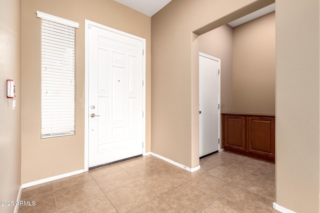 41804 W Carlisle Ln, Maricopa, AZ 85138 - entryway with baseboards and light tile patterned floors