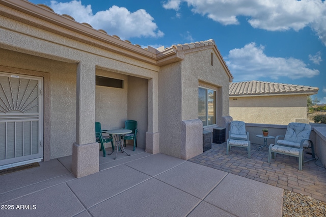 view of patio / terrace with central air condition unit