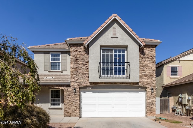 view of front of property with a garage